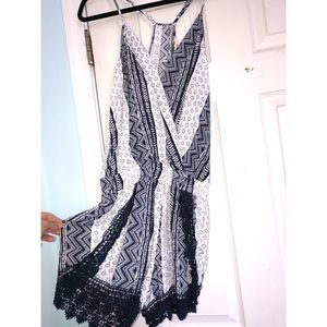 Navy and White romper. Lace hems. Open front